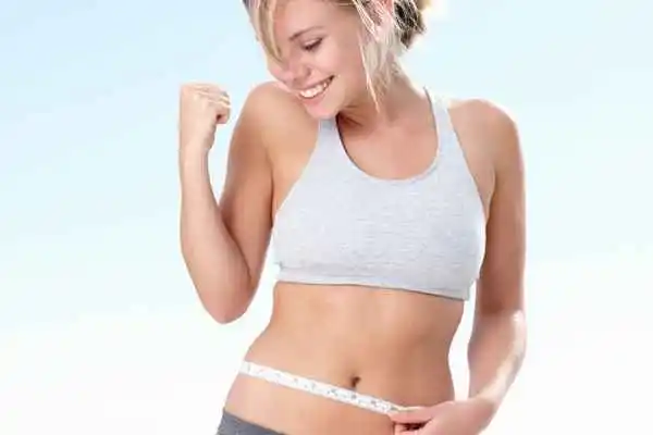 woman happy after fat reduction treatment Brixton